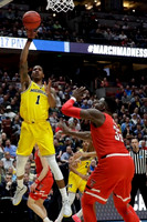 Charles Matthews (1) and Jordan Poole (2)