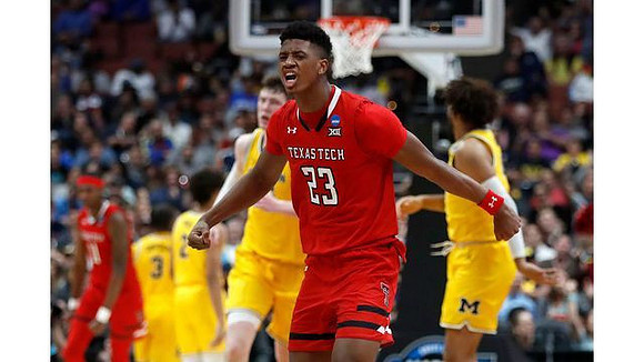 Zavier Simpson (3), Jordan Poole (2), Jon Teske (15), and Isaiah Livers (4)