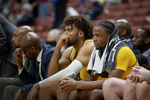 Saddi Washington, Deandre Haynes, Isaiah Livers (4), and Zavier Simpson (3)