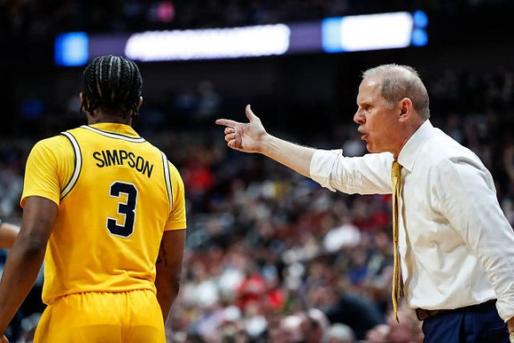 Zavier Simpson (3) and John Beilein