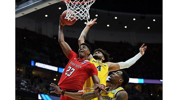 Charles Matthews (1) and Isaiah Livers (4)