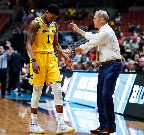 Charles Matthews (1) and John Beilein