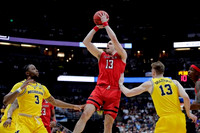 Zavier Simpson (3) and Ignas Brazdeikis (13)
