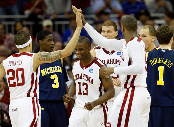 Manny Harris (3) and Stu Douglass (1)