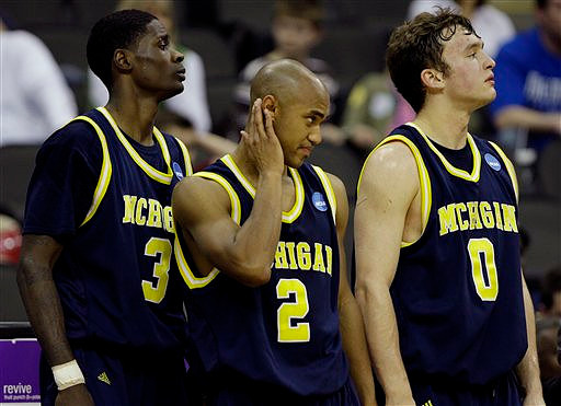 Manny Harris (3), C.J. Lee (2), and Zack Novak (0)