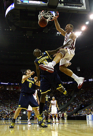 Zack Novak (0), Laval Lucas-Perry (31), and Anthony Wright (12)