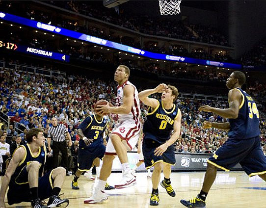 Stu Douglass (1), Manny Harris (3), Zack Novak (0), and DeShawn Sims (34)