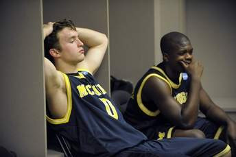 Zack Novak (0) and Laval Lucas-Perry (31)