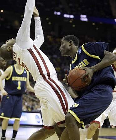 Manny Harris (3) and Stu Douglass (1)