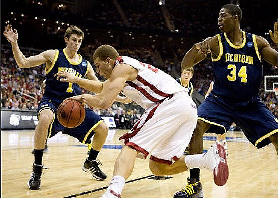 Stu Douglass (1), Zack Novak (0), and DeShawn Sims (34)