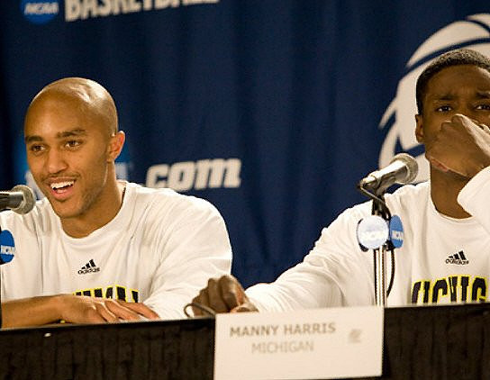 C.J. Lee (2) and Manny Harris (3)