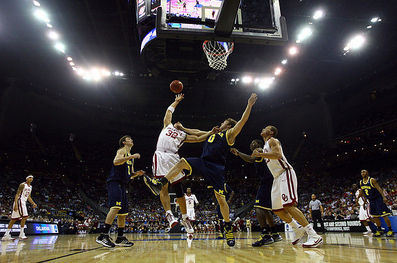 Zack Novak (0), Stu Douglass (1), DeShawn Sims (34), and C.J. Lee (2)