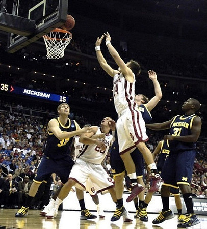 Zack Gibson (32), Zack Novak (0), and Laval Lucas-Perry (31)