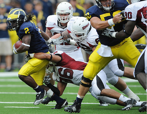 Vincent Smith (2) and David Molk (50)