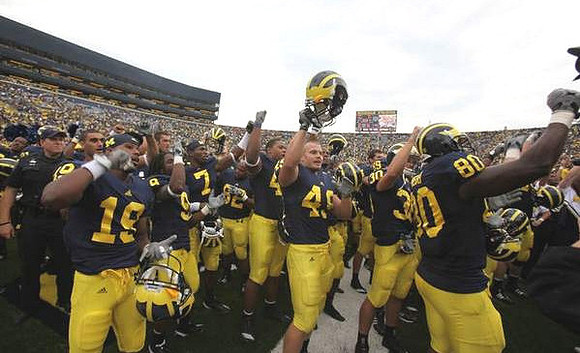 Kelvin Grady (19), Martavious Odoms (9), Devin Gardner (7), John McColgan (49), Doug Rogan (30), and Martell Webb (80)