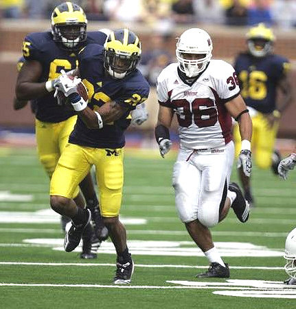 Patrick Omameh (65), Michael Shaw (20), and Denard Robinson (16)