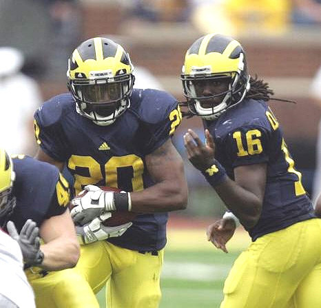 John McColgan (49), Michael Shaw (20), and Denard Robinson (16)