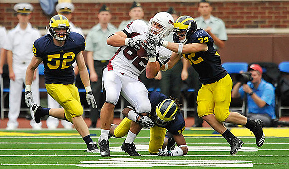 Stephen Schilling (52), Roy Roundtree (12), and Darryl Stonum (22)