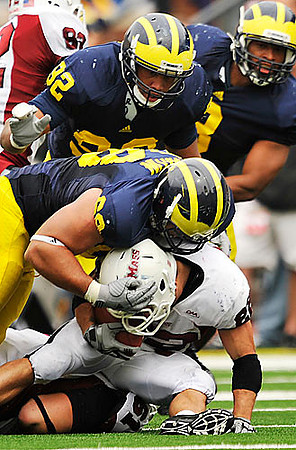 Greg Banks (92), Mike Martin (68), and Jonas Mouton (8)