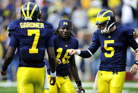 Devin Gardner (7), Denard Robinson (16), and Tate Forcier (5)
