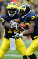 Denard Robinson (16) and Michael Shaw (20)