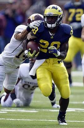 Fitzgerald Toussaint (28) and Mark Huyge (72)