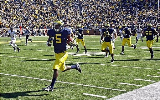 Courtney Avery (5), Josh Furman (14), Quinton Washington (76), and Jibreel Black (55)