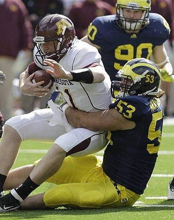 Jake Ryan (90) and Ryan Van Bergen (53)