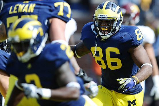 Vincent Smith (2), Kevin Koger (86), and Taylor Lewan (77)