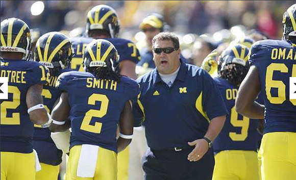 Roy Roundtree (12), Vincent Smith (2), Taylor Lewan (77), Brady Hoke, Martavious Odoms (9), and Patrick Omameh (65)