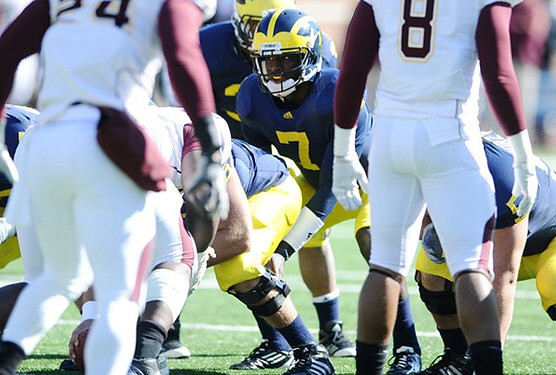 Devin Gardner (7) and Thomas Rawls (38)