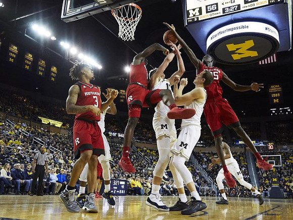 Moritz Wagner (13) and Duncan Robinson (22)