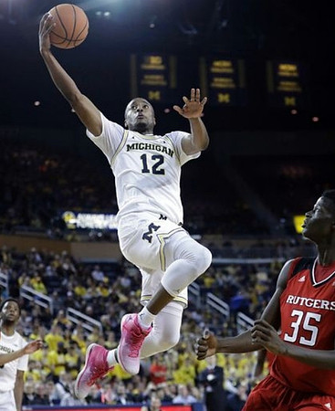 Zavier Simpson (3) and Muhammad-Ali Abdur-Rahkman (12)