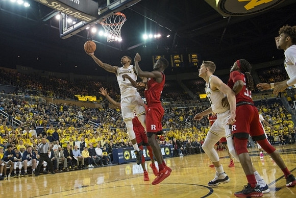 Charles Matthews (1), Moritz Wagner (13), and Isaiah Livers (4)