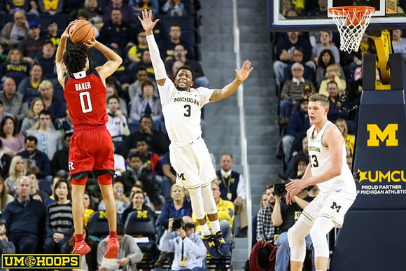 Zavier Simpson (3) and Moritz Wagner (13)