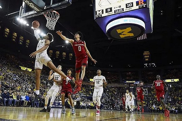 Jordan Poole (2), Duncan Robinson (22), Muhammad-Ali Abdur-Rahkman (12), and Jaaron Simmons (5)