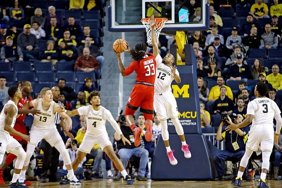 Charles Matthews (1), Moritz Wagner (13), Isaiah Livers (4), Muhammad-Ali Abdur-Rahkman (12), and Zavier Simpson (3)