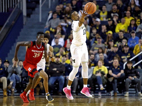 Muhammad-Ali Abdur-Rahkman (12) and Ibi Watson (23)