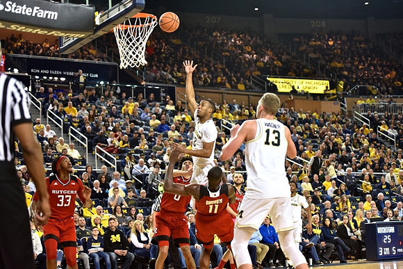 Muhammad-Ali Abdur-Rahkman (12), Moritz Wagner (13), and Zavier Simpson (3)