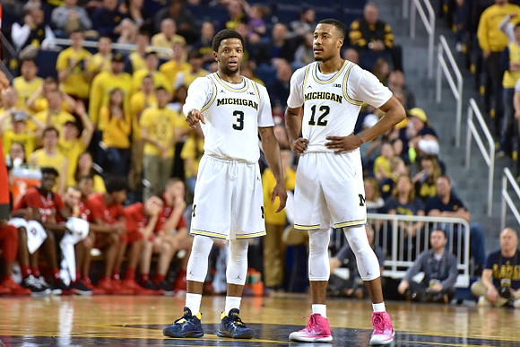 Zavier Simpson (3) and Muhammad-Ali Abdur-Rahkman (12)