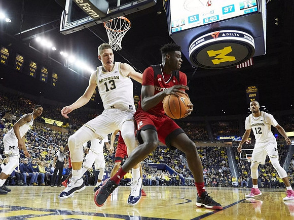 Charles Matthews (1), Moritz Wagner (13), Zavier Simpson (3), and Muhammad-Ali Abdur-Rahkman (12)