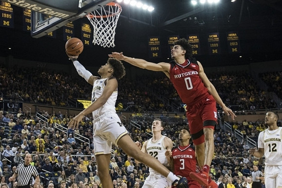 Jordan Poole (2), Duncan Robinson (22), and Muhammad-Ali Abdur-Rahkman (12)