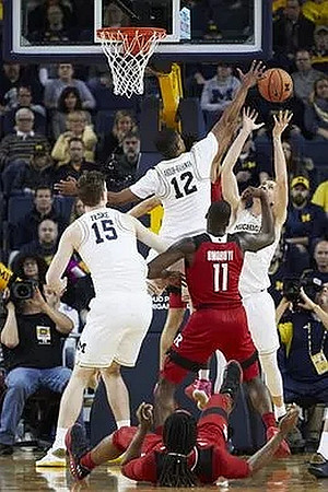 Moritz Wagner (13), Muhammad-Ali Abdur-Rahkman (12), and Duncan Robinson (22)