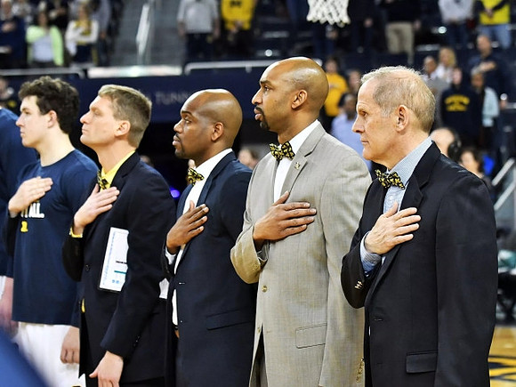 Luke Yaklich, Deandre Haynes, Saddi Washington, and John Beilein