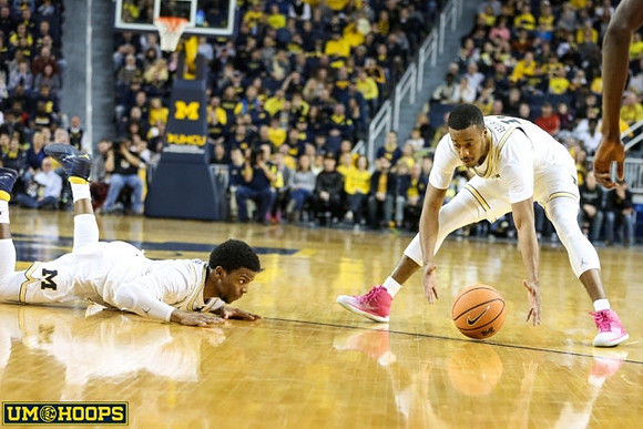Zavier Simpson (3) and Muhammad-Ali Abdur-Rahkman (12)