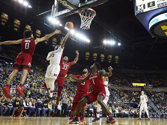 Zavier Simpson (3) and Duncan Robinson (22)