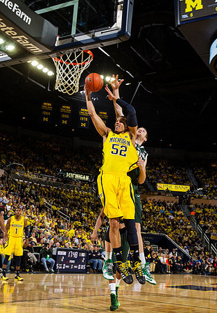 Glenn Robinson III (1) and Jordan Morgan (52)