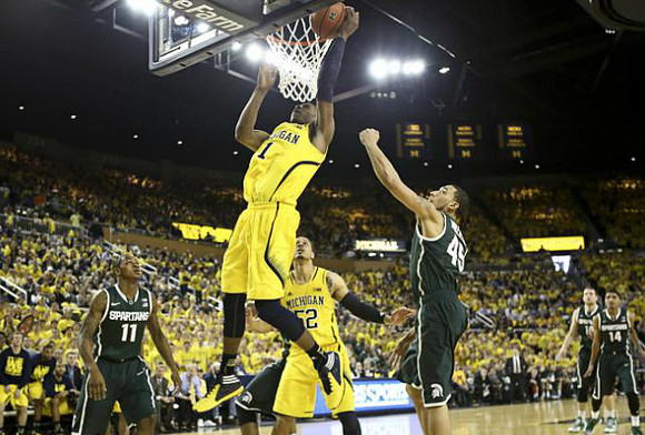 Glenn Robinson III (1) and Jordan Morgan (52)