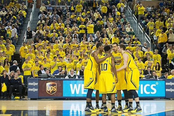Glenn Robinson III (1), Derrick Walton Jr. (10), Jordan Morgan (52), and Nik Stauskas (11)