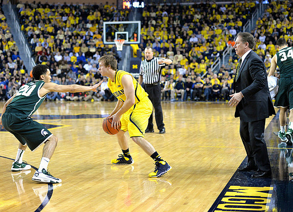 Spike Albrecht (2) and Michigan State Head Coach Tom Izzo